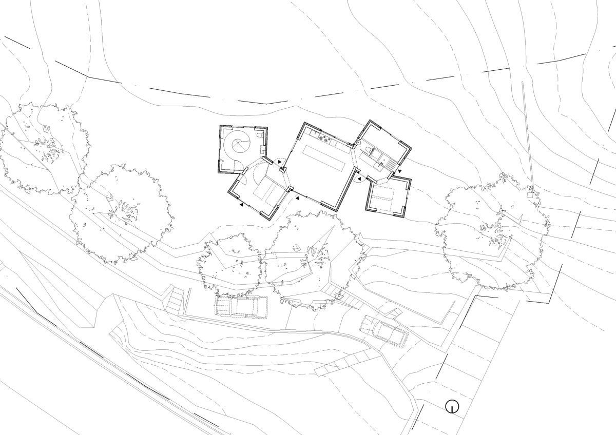 Teepee-shaped buildings by Issei Suma house community kitchen and pool