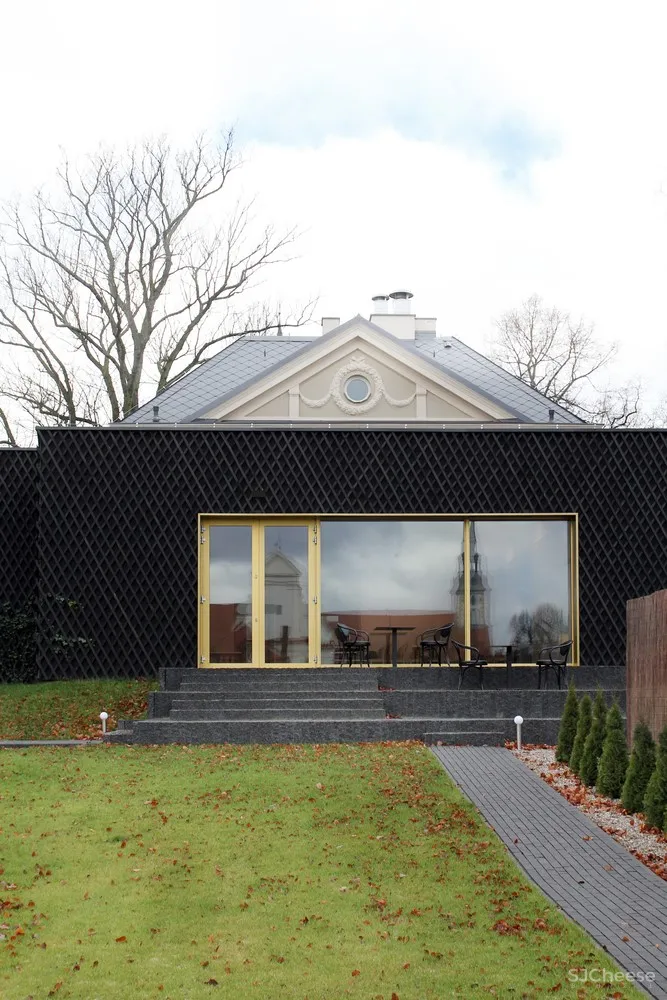 PB STUDIO | 波兰历史建筑扩建成温馨酒店