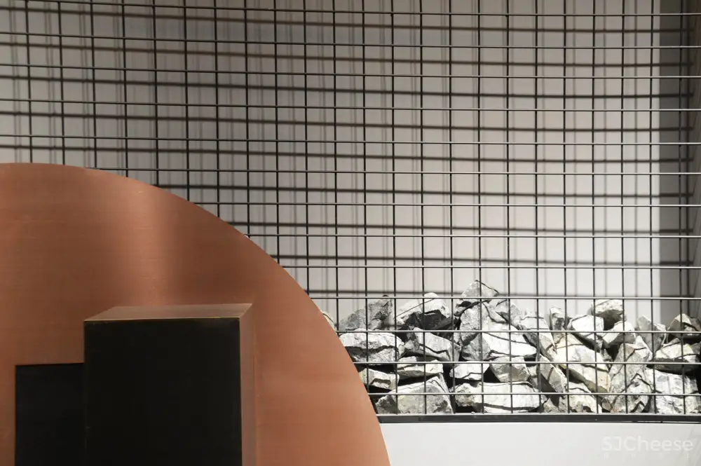 煜哲男装—堆积中的光与影丨术锐室内设计