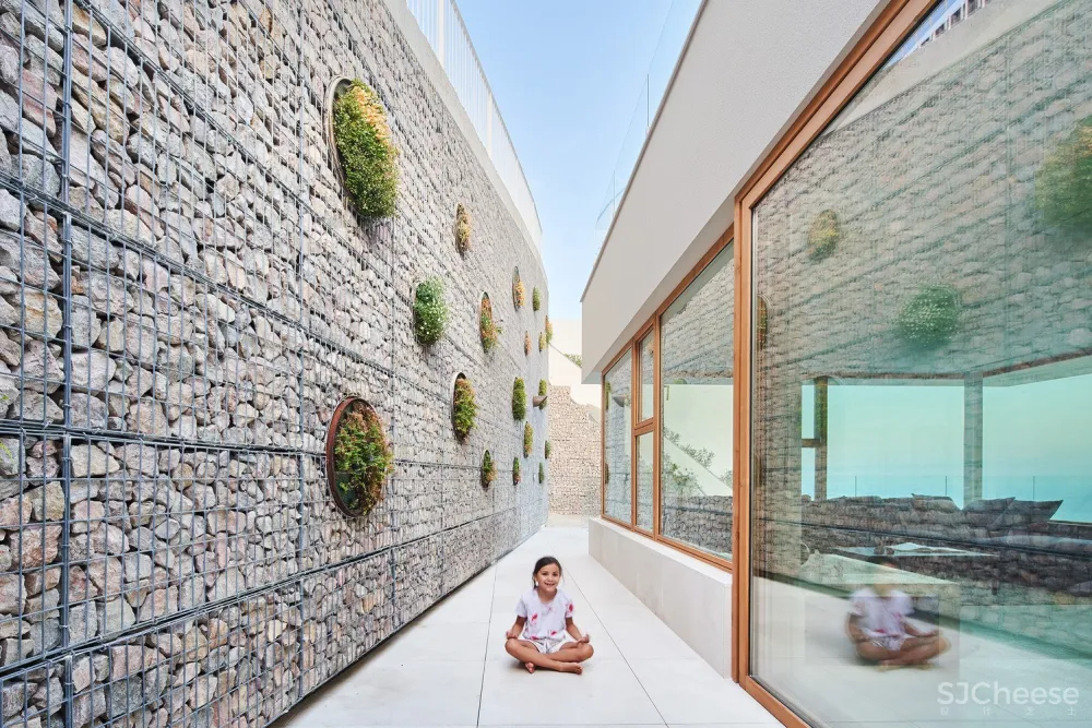 Miel Arquitectos 日光花园景观住宅