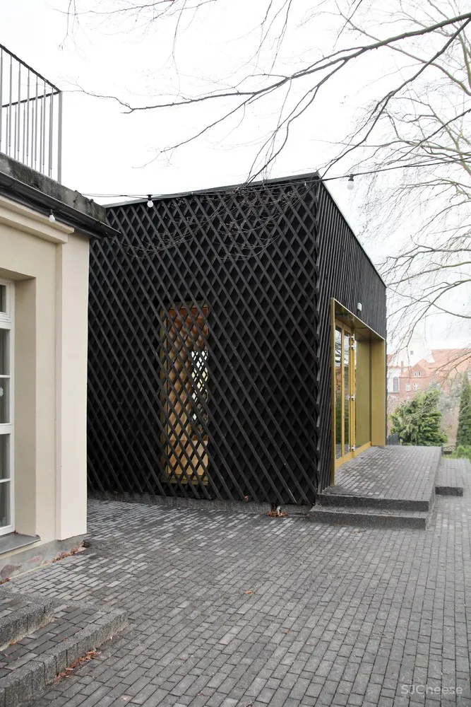 PB STUDIO | 波兰历史建筑扩建成温馨酒店