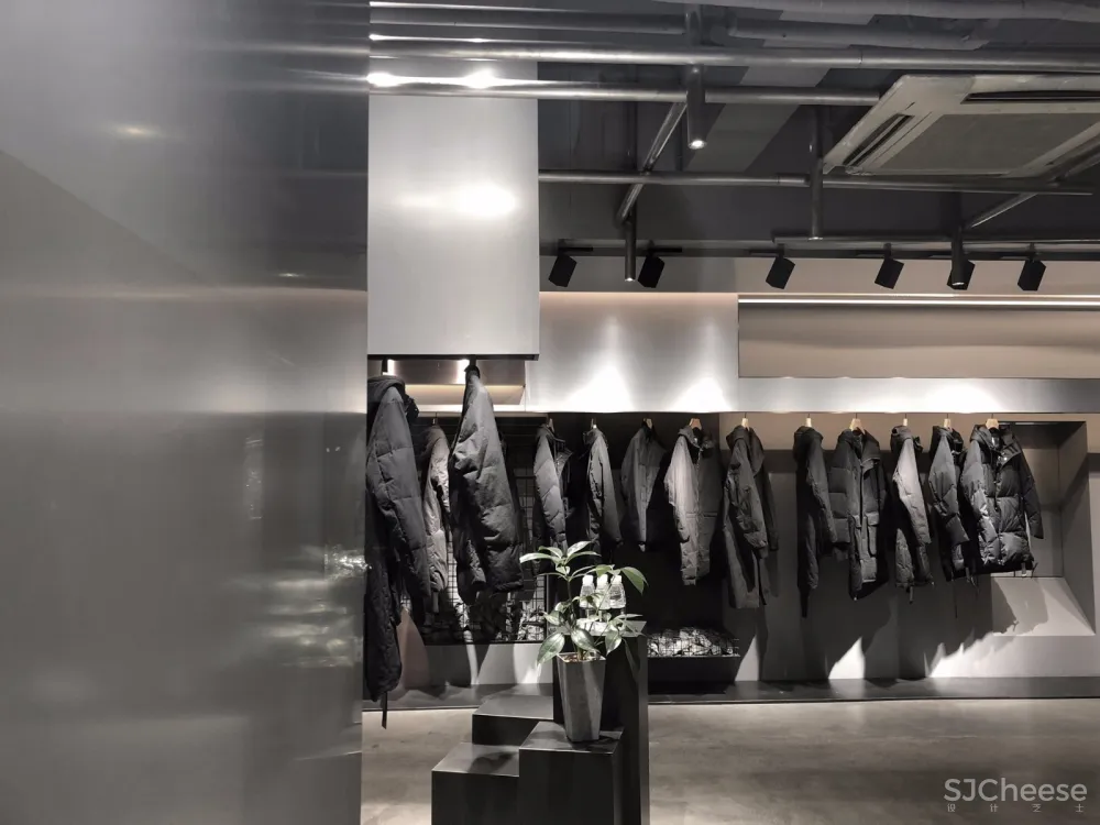 煜哲男装—堆积中的光与影丨术锐室内设计 首