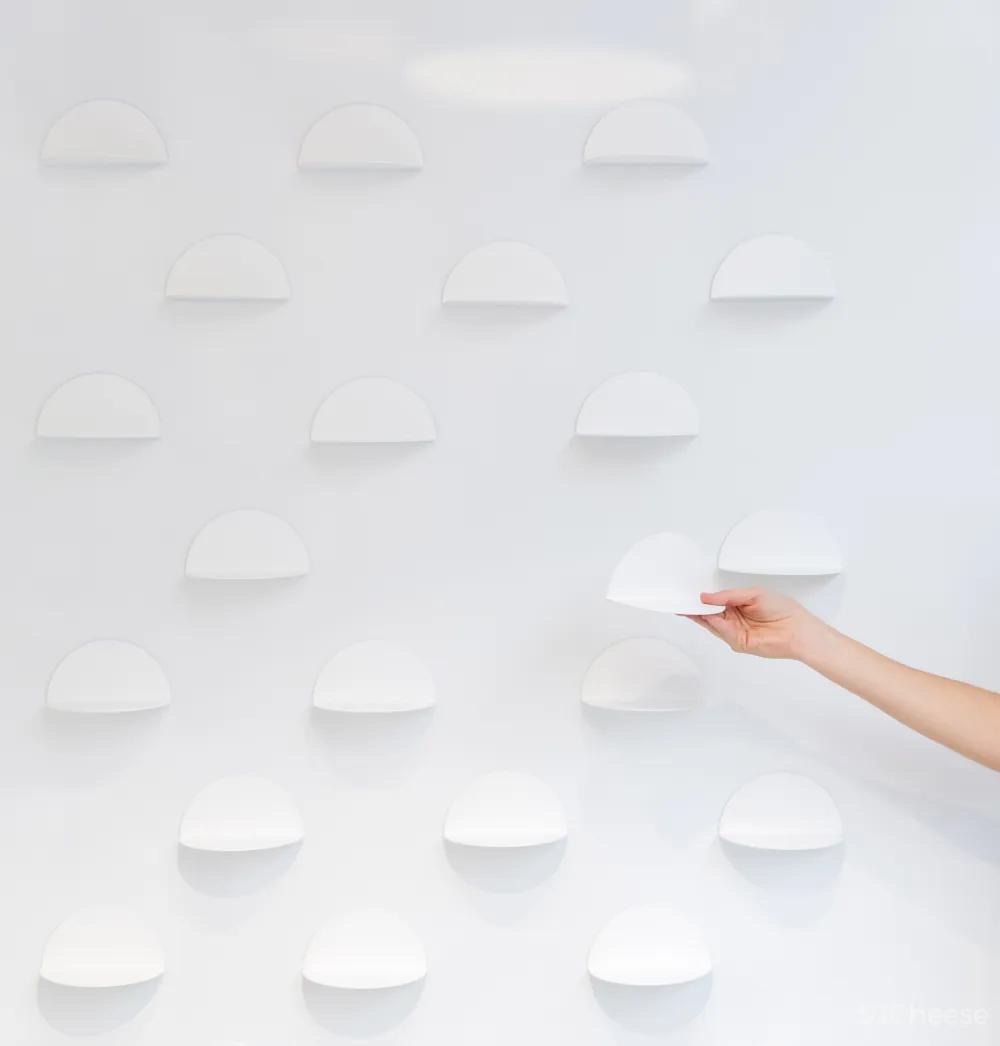 Arched doorways and bold hues feature inside Little Stories shoe store