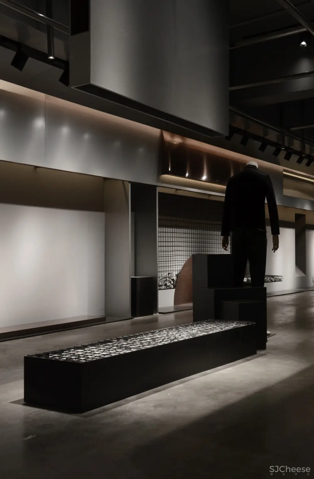 煜哲男装—堆积中的光与影丨术锐室内设计