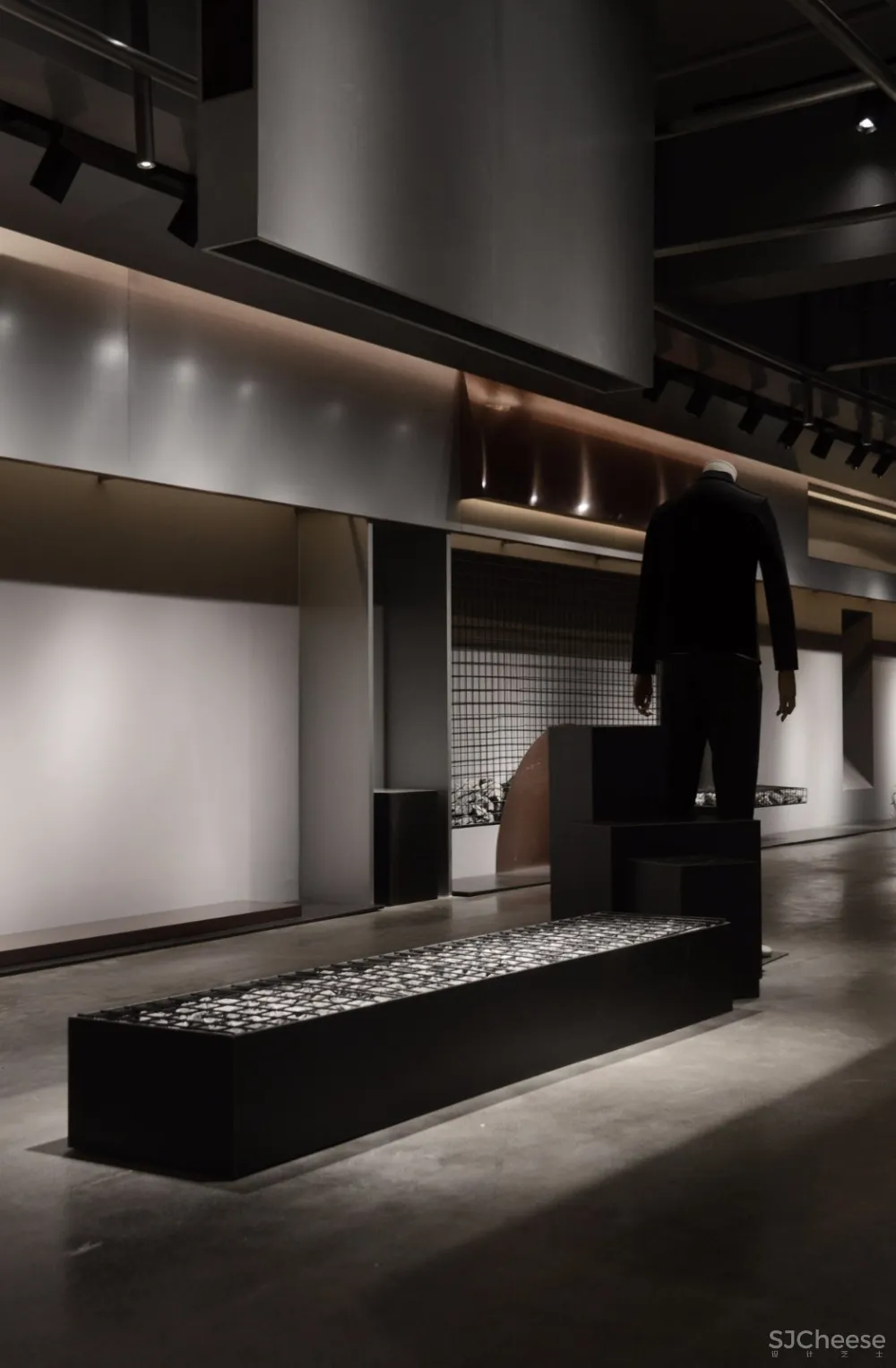 煜哲男装—堆积中的光与影丨术锐室内设计 首