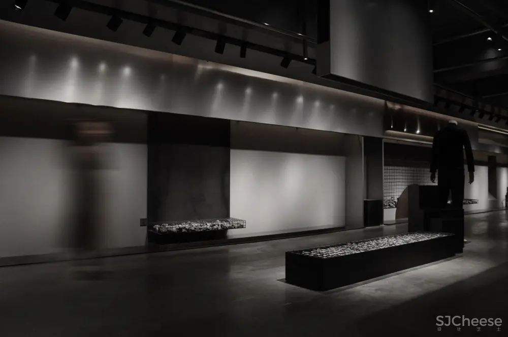 煜哲男装—堆积中的光与影丨术锐室内设计