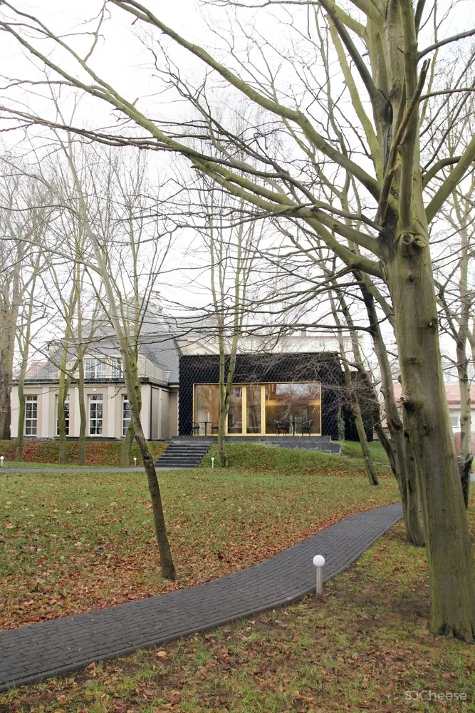 PB STUDIO | 波兰历史建筑扩建成温馨酒店