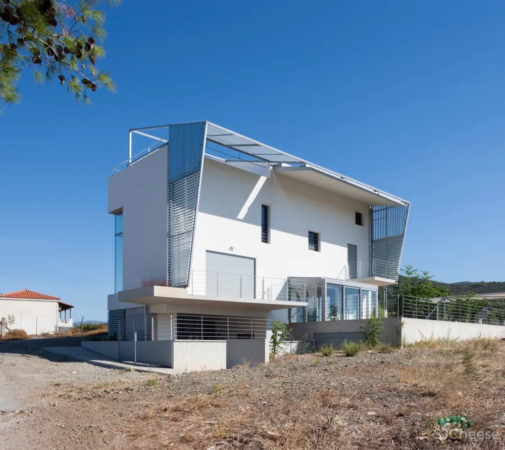 Ntovros Vasileios Architects | 俯瞰大海的希腊清新小别墅