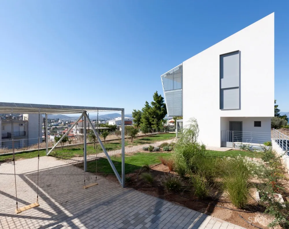 Ntovros Vasileios Architects | 俯瞰大海的希腊清新小别墅