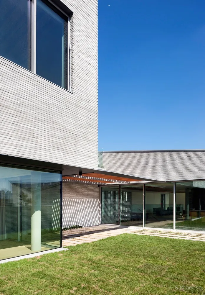 D•LIM architects | 既不花哨，也不简单：三花园住宅