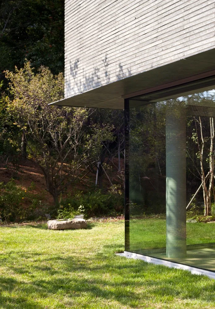 D•LIM architects | 既不花哨，也不简单：三花园住宅