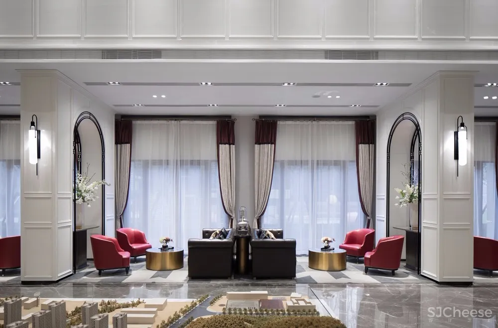 以“下午茶”为氛围主题丨营造出古典英伦风与现代摩登感交织共映的售楼空间