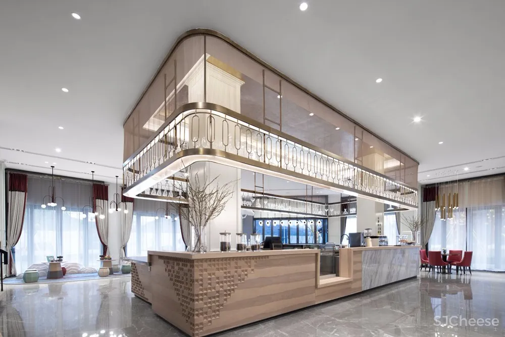 以“下午茶”为氛围主题丨营造出古典英伦风与现代摩登感交织共映的售楼空间