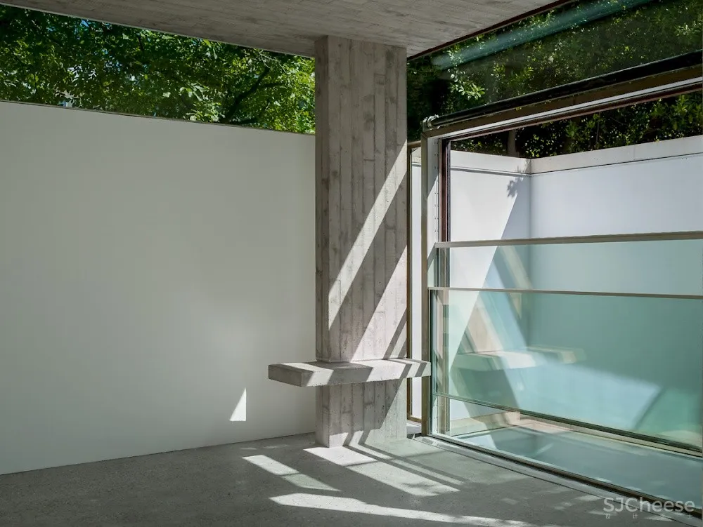 车库爆改成两房两卫丨水磨石和混凝土真的很配