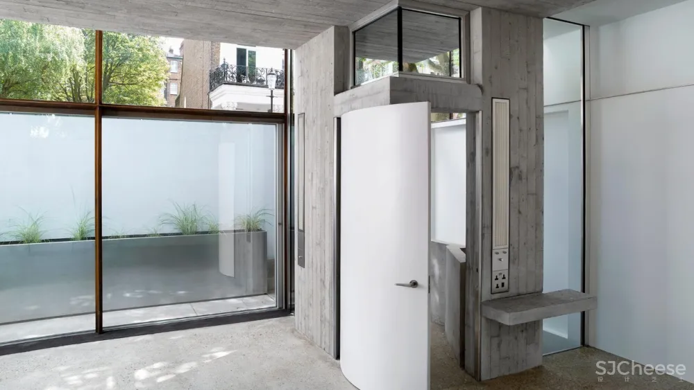 车库爆改成两房两卫丨水磨石和混凝土真的很配