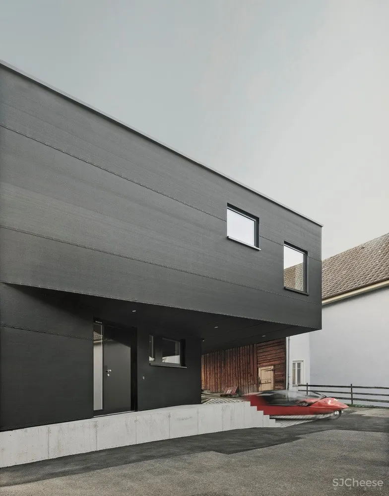 Haus D,顺时针旋转的黑色住宅 / Yonder – Architektur und Design