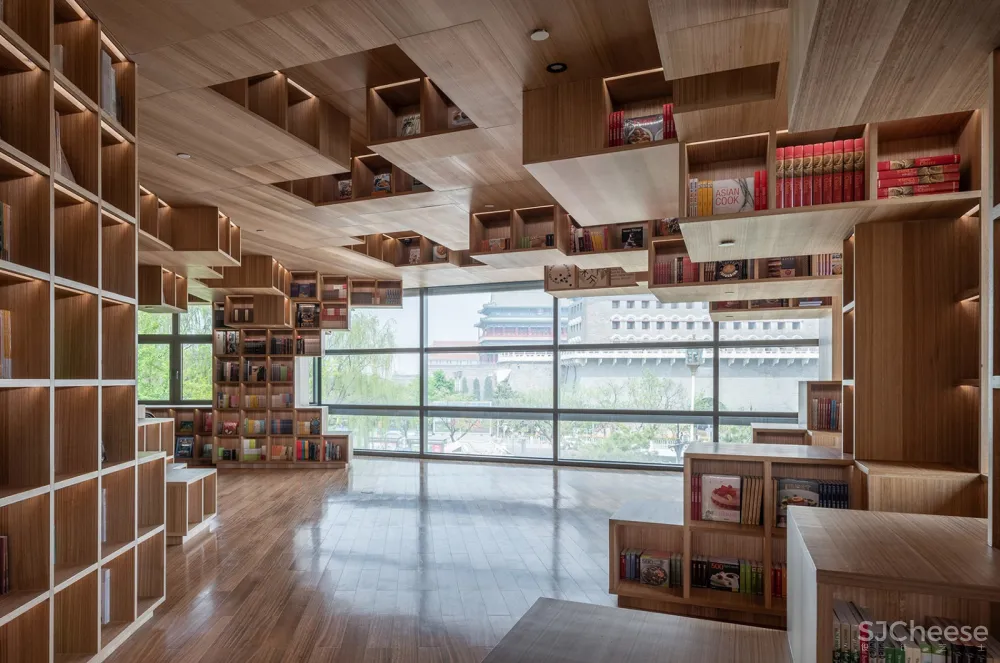 以“街巷”概念延续城市视角与空间体验,Page One 北京坊书店 直向建筑