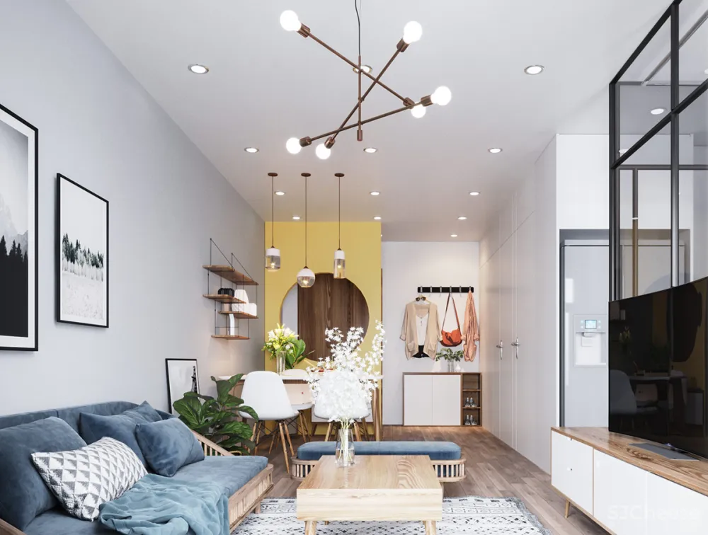 粉蓝色休闲家具和水仙花黄色特色墙让这个家轻松自在 KienKt Studio