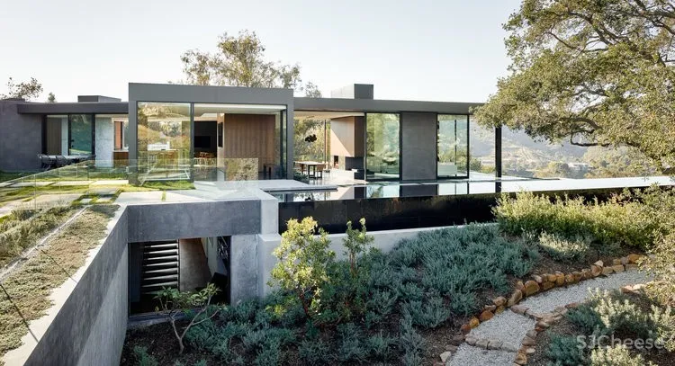 被130棵活了250年古橡树包围的现代住宅丨每天关门窗花40分钟