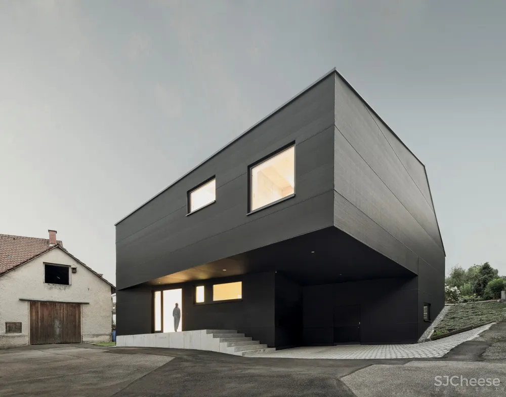 Haus D,顺时针旋转的黑色住宅 / Yonder – Architektur und Design