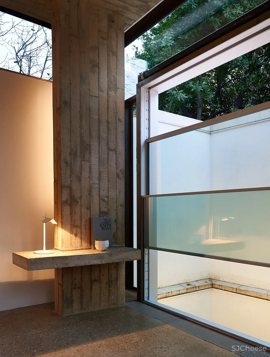 车库爆改成两房两卫丨水磨石和混凝土真的很配