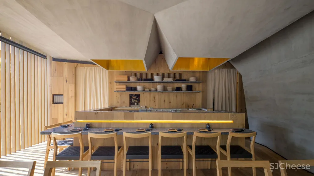 Michan Architecture在墨西哥城的Oku餐厅上方创造了“洞穴式”天花板