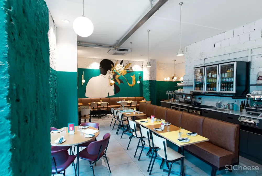 粗糙纹理和鲜亮色彩搭配，米兰手工披萨店 Rizoma Architetture