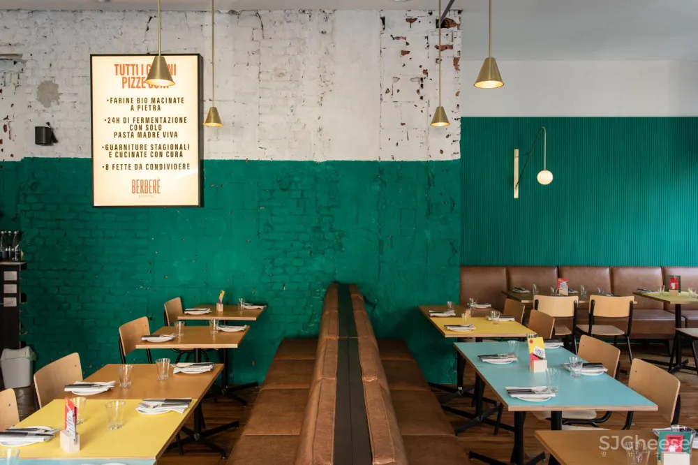 粗糙纹理和鲜亮色彩搭配，米兰手工披萨店 Rizoma Architetture