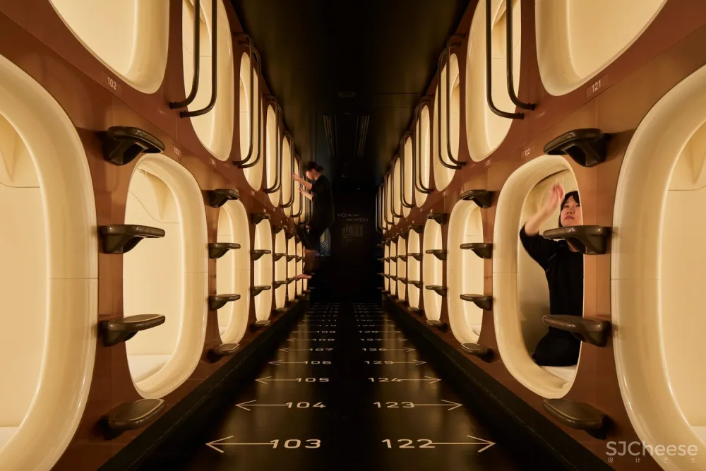 大阪九小时胶囊旅馆,灯光调节情绪 / 成濑·猪熊建筑设计事务所