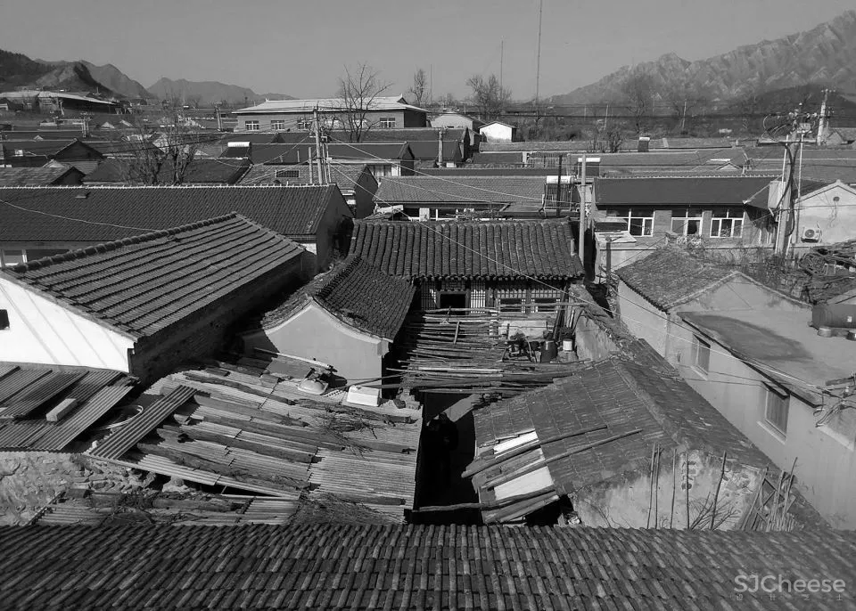 北京这栋沉静百年的老宅没有爆改,却把过道运用得淋漓尽致!