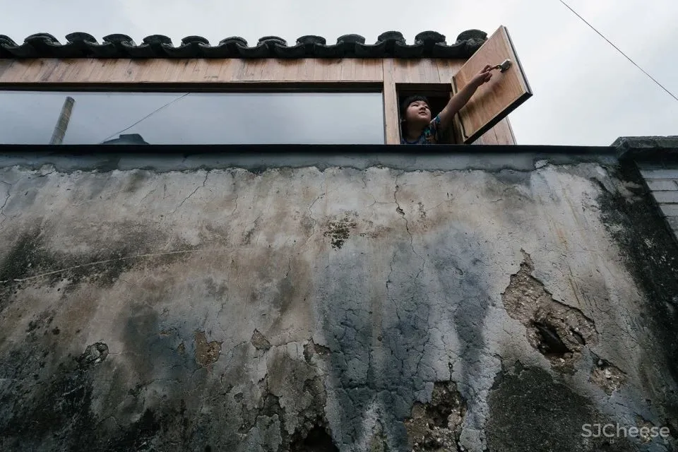 北京这栋沉静百年的老宅没有爆改,却把过道运用得淋漓尽致!