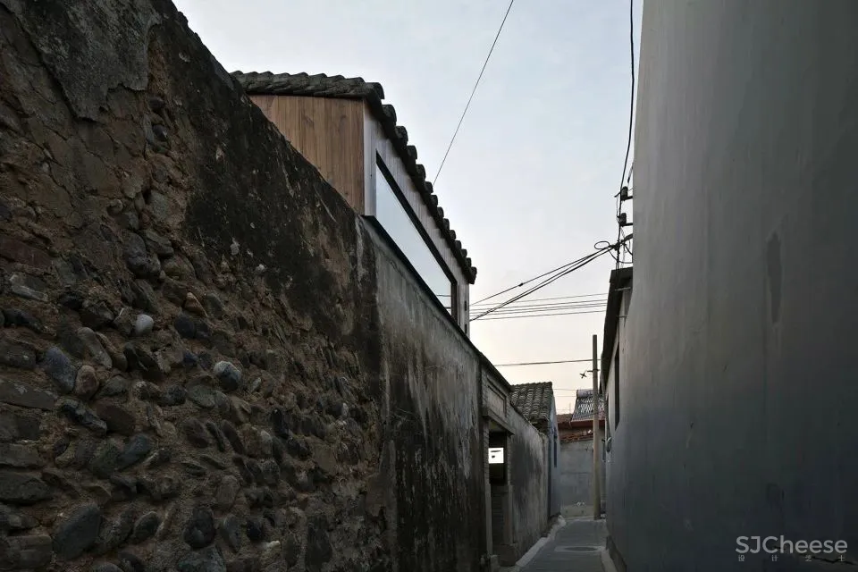 北京这栋沉静百年的老宅没有爆改,却把过道运用得淋漓尽致!