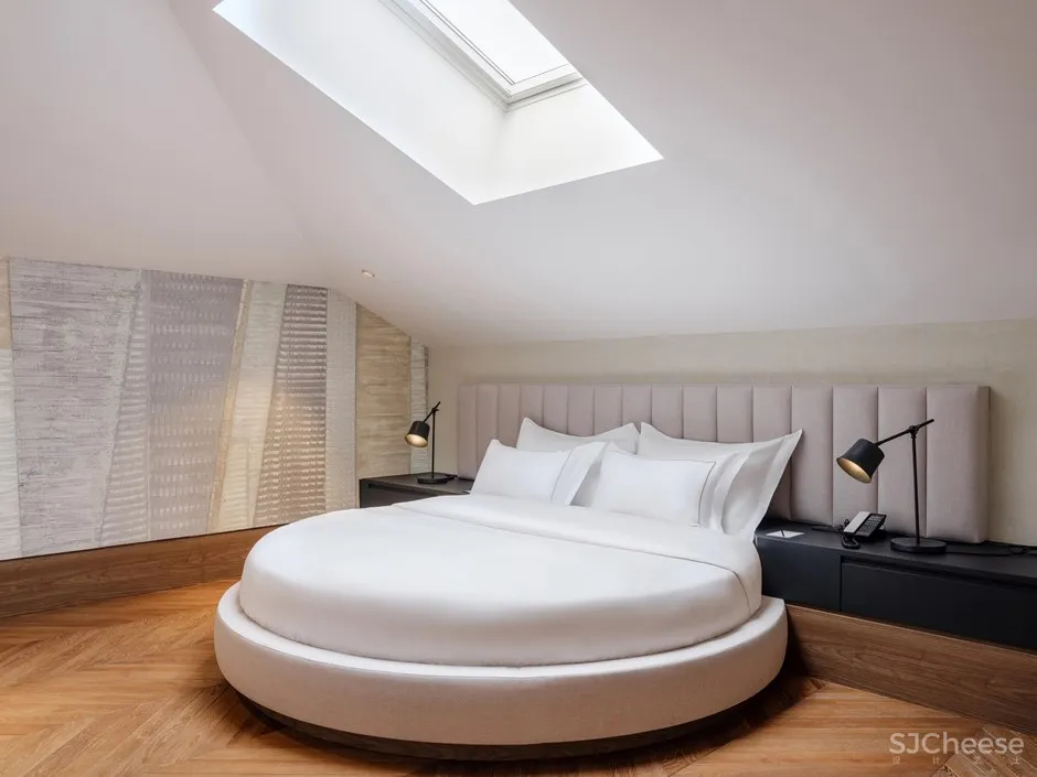 百年医院爆改五星级酒店,历史建筑表皮下,内里却这么前卫时尚