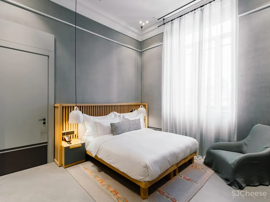 百年医院爆改五星级酒店,历史建筑表皮下,内里却这么前卫时尚