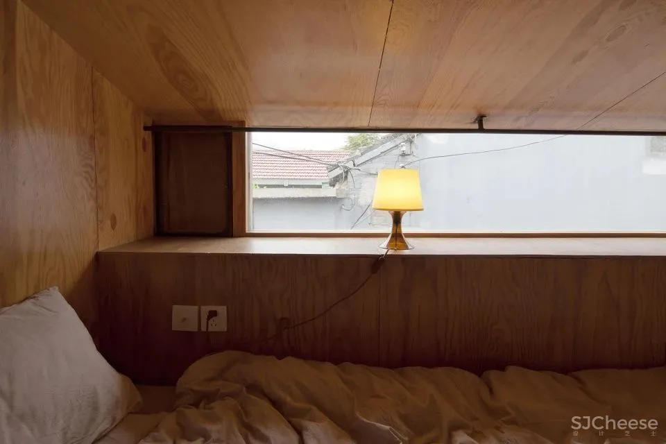 北京这栋沉静百年的老宅没有爆改,却把过道运用得淋漓尽致!