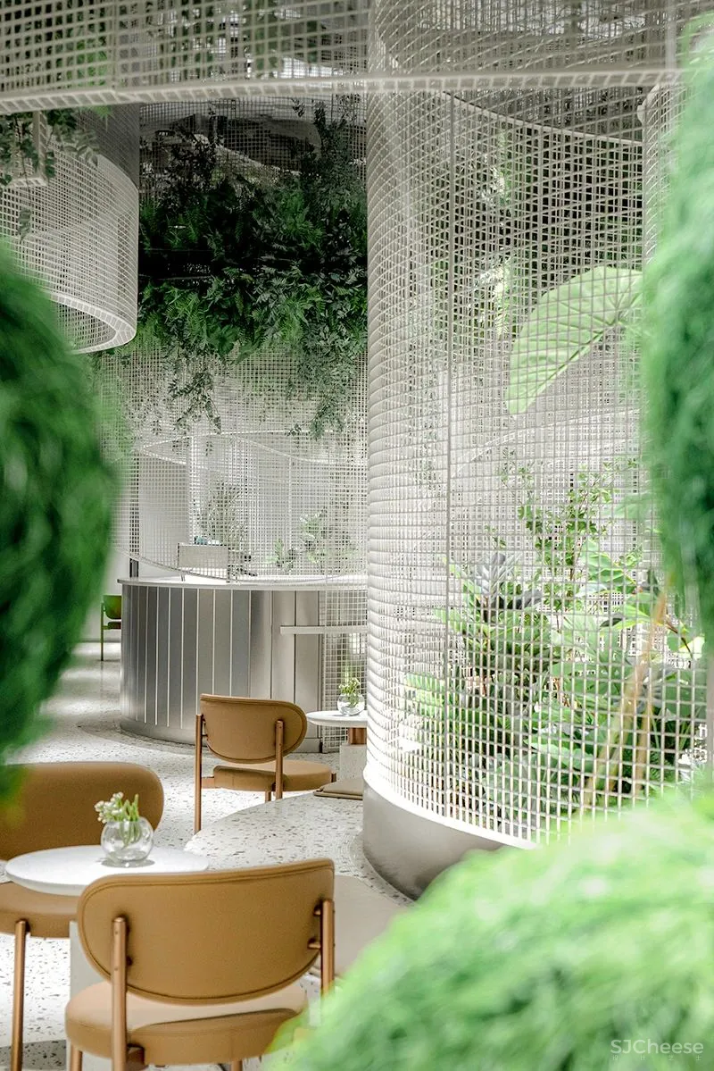 峻佳设计丨水上的白色花园,超现实主义咖啡馆打造城市记忆封面