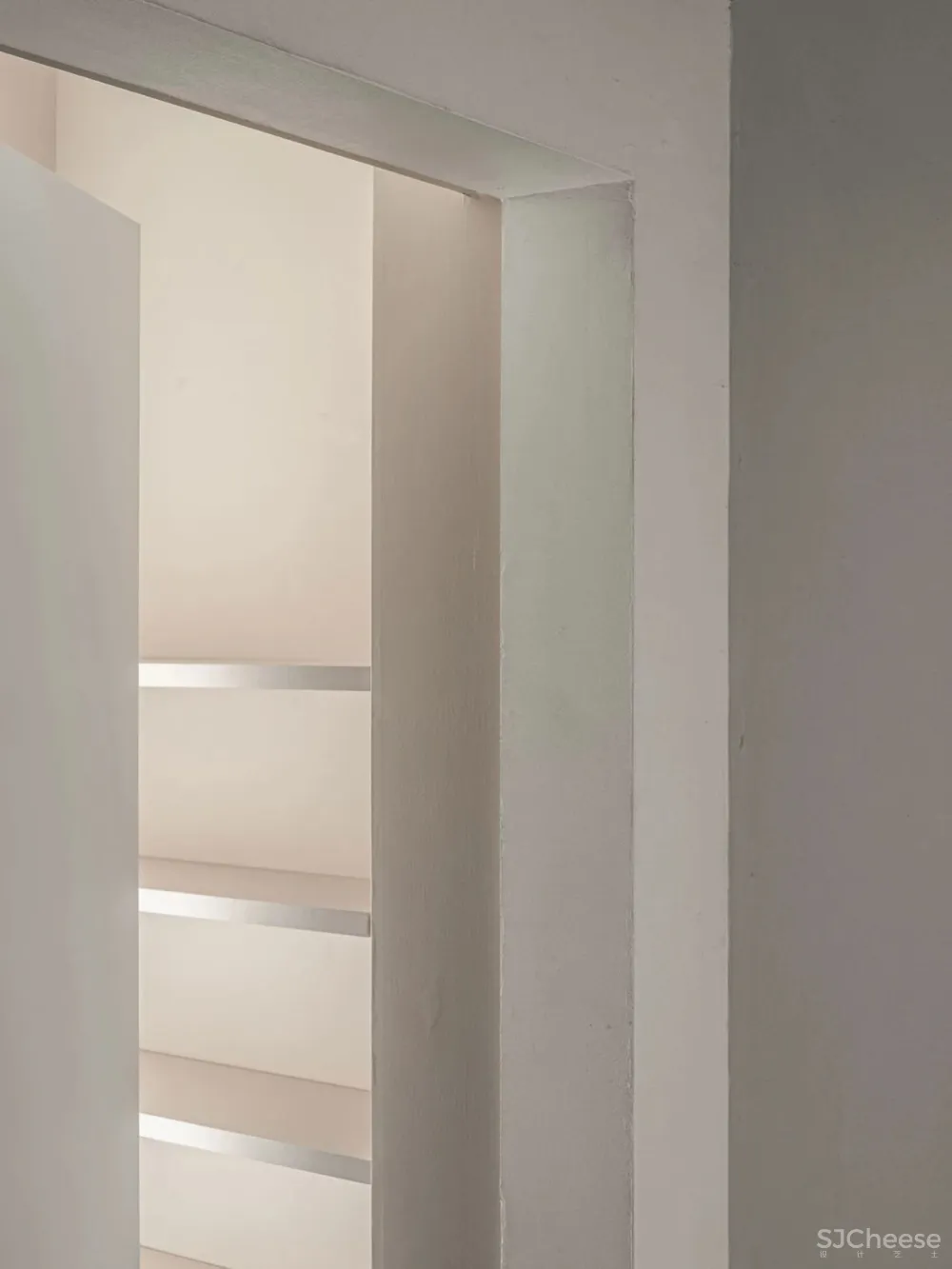 简约的现代公寓,用混凝土、木材、肌理涂料做出高级的层次感