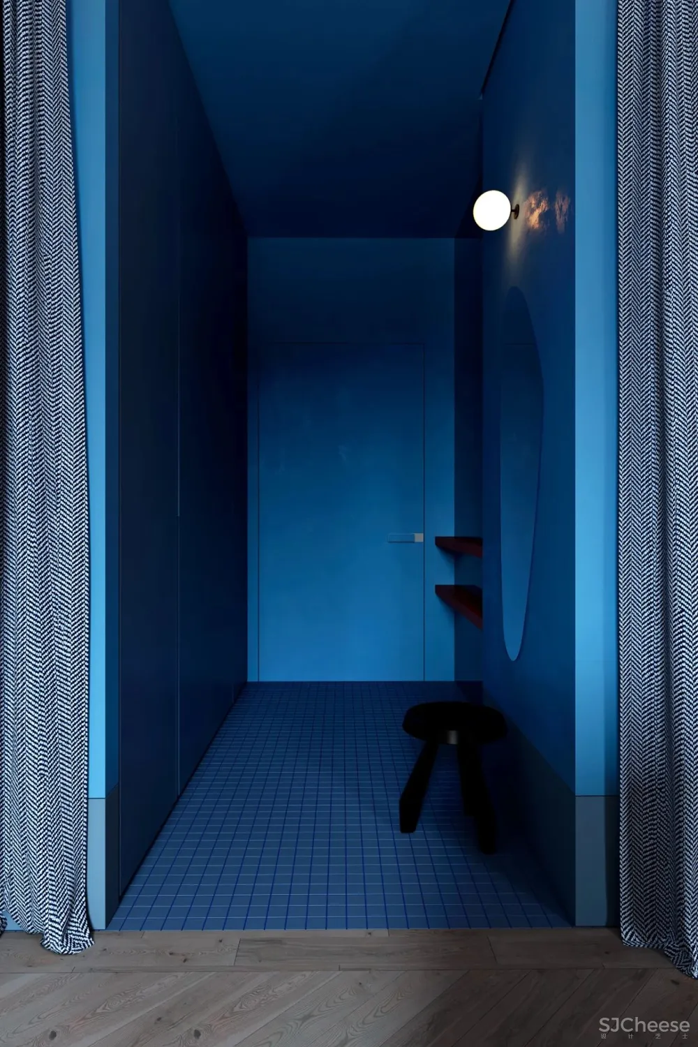 用蓝色和橙色装点室内,这间单身公寓充满了活力与精致