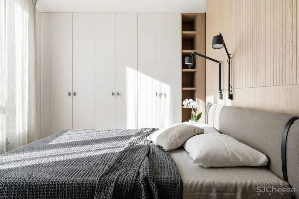 简约风的两室一厅,卧室用木饰面做背景太有范了!