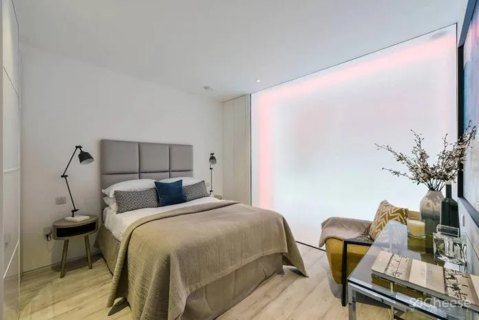 将一家旧轮胎店改造成两个设计精美的小别墅 Hogarth Architects