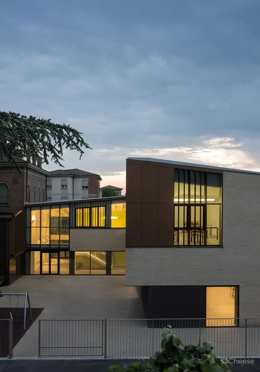 Regina Pacis Community Center Iotti + Pavarani Architetti