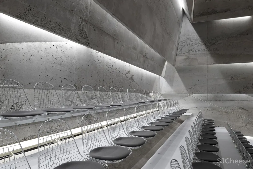 A Tilted, Submerged Concert Hall by Peter Haimerl Architektur