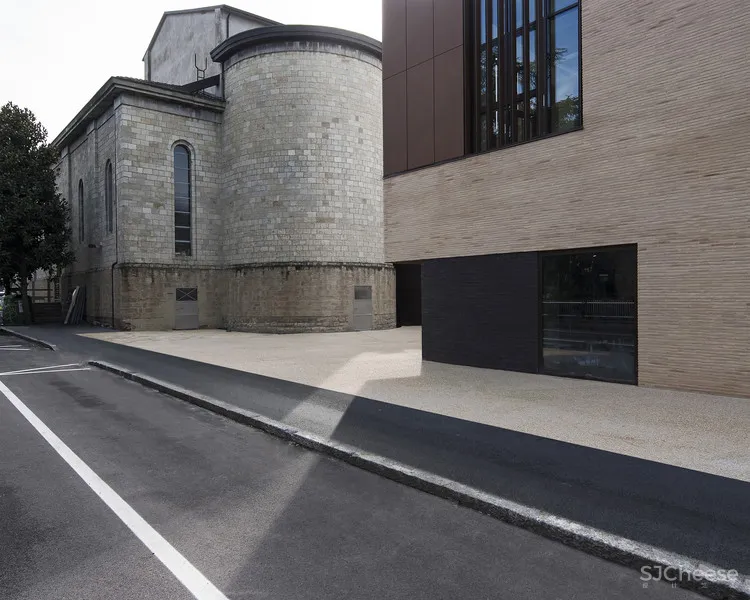 Regina Pacis Community Center Iotti + Pavarani Architetti