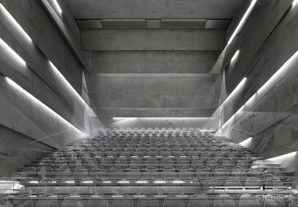 A Tilted, Submerged Concert Hall by Peter Haimerl Architektur