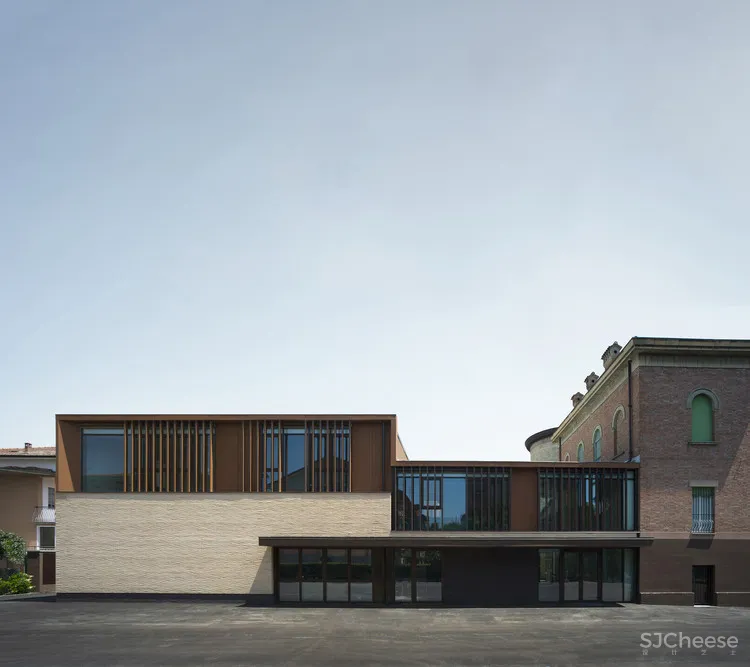 Regina Pacis Community Center Iotti + Pavarani Architetti