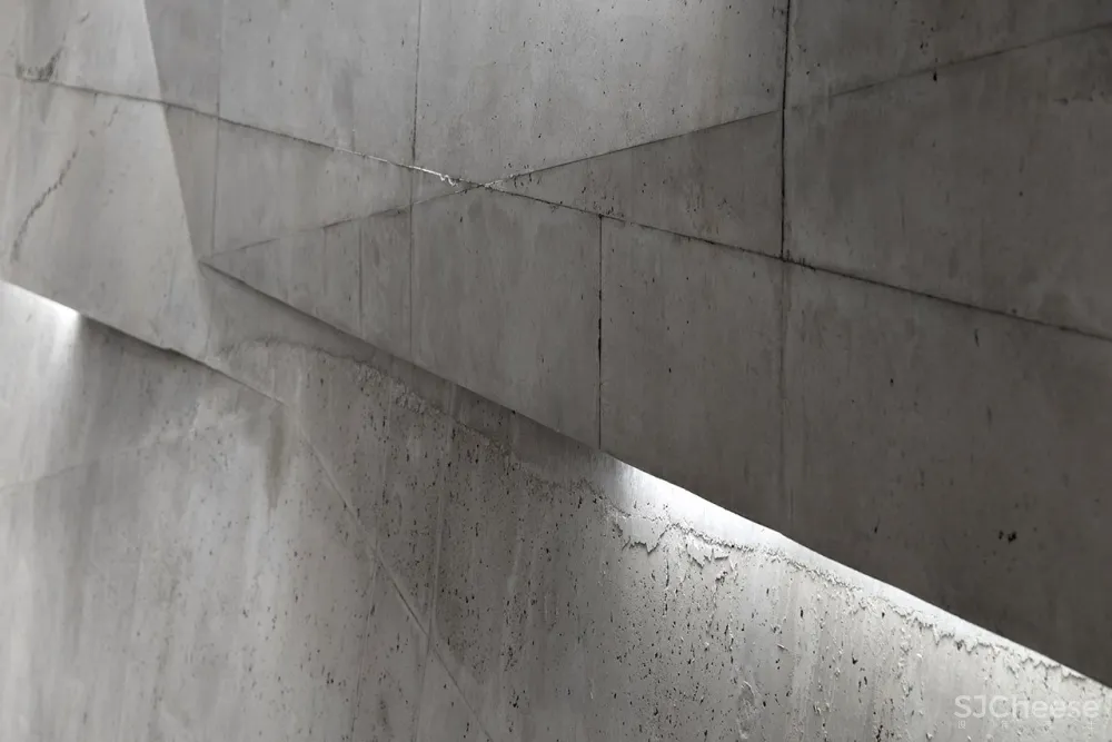 A Tilted, Submerged Concert Hall by Peter Haimerl Architektur