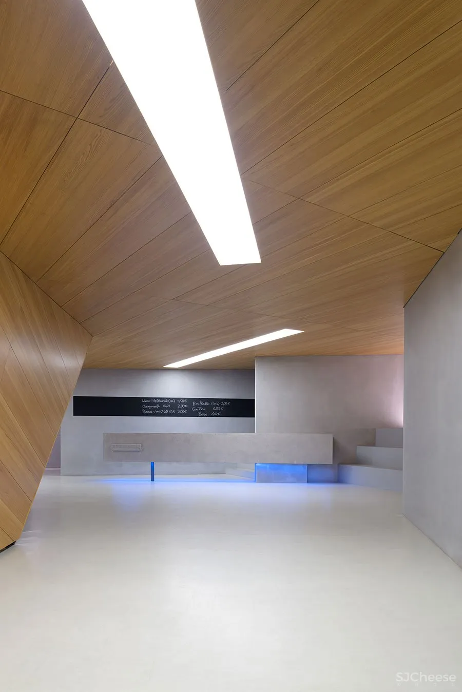 A Tilted, Submerged Concert Hall by Peter Haimerl Architektur