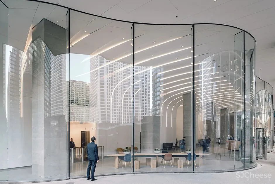弧形玻璃幕墙+从墙到顶的天花,这个大堂改造太惊艳!