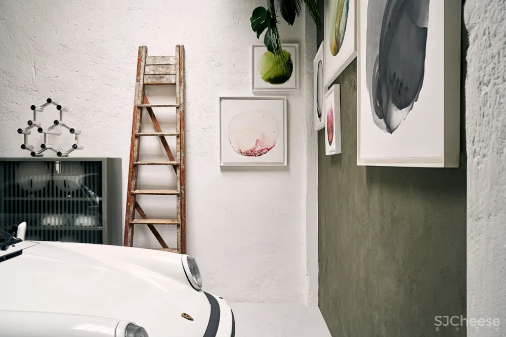 摆满艺术品的 LOFT,才是有腔调的家