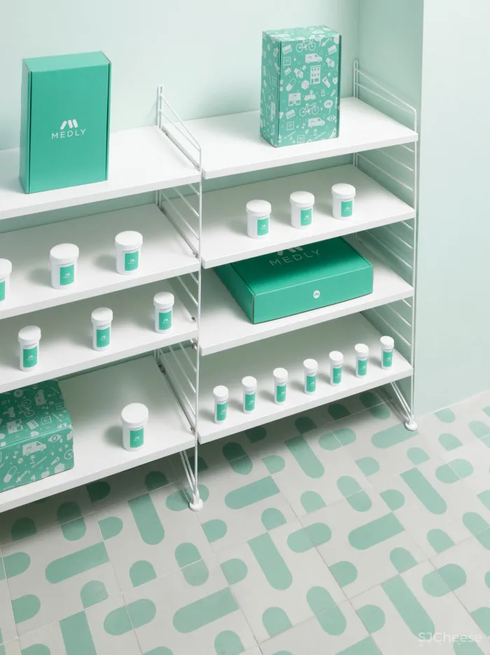 Pharmacy app opens Brooklyn waiting room featuring calming turquoise tones